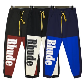 2023SS Спортивные брюки Rhude с вышивкой Буквой Мужские Женские брюки с завязками в стиле пэчворк Rhude Брюки